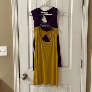 A pair of Large Impeccable Pig tunic tanks